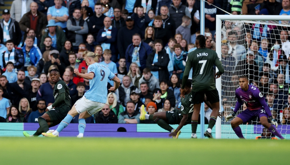 Manchester City's Erling Braut Haaland scores their fourth goal during the EPL match against Southampton at the Etihad Stadium in Manchester on October 8, 2022.  REUTERS/Phil Noble 