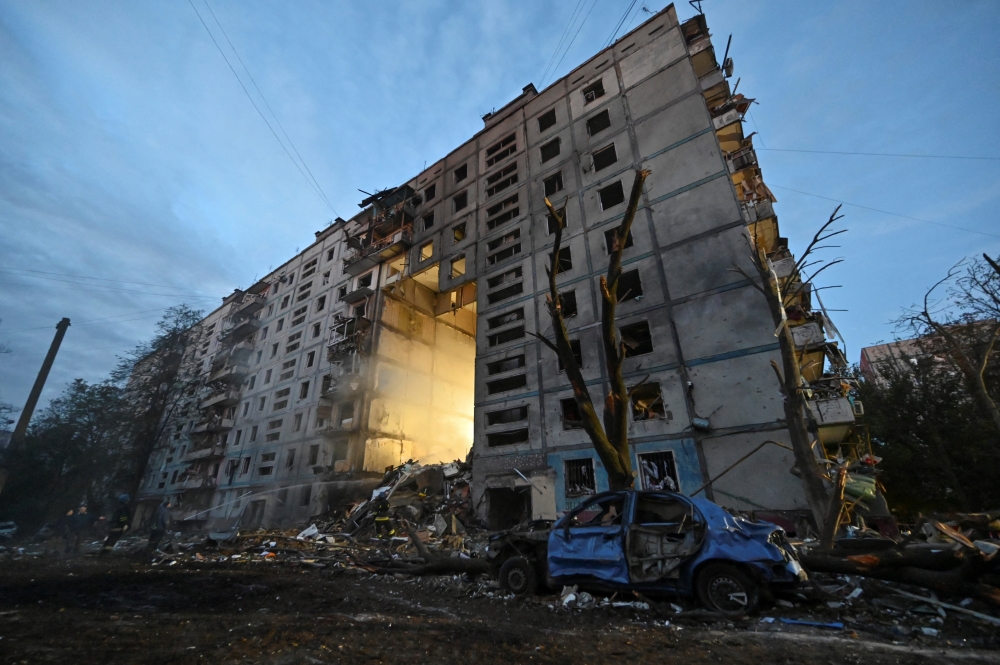 A view shows a residential building heavily damaged by a Russian missile strike, amid Russia's attack on Ukraine, in Zaporizhzhia, Ukraine, October 9, 2022. (REUTERS/Stringer)
