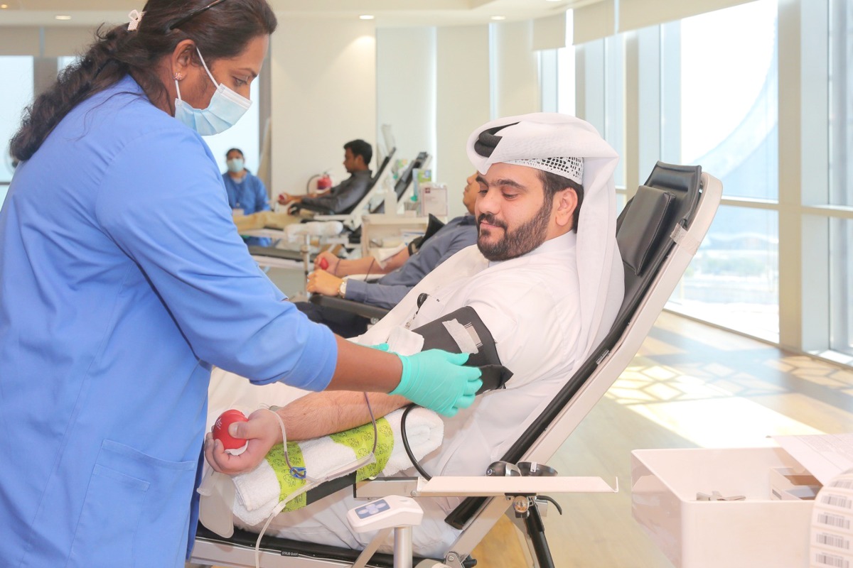 Staff from Masraf Al Rayan and Hamad Medical Corporation during the blood donation campaign, in Doha, recently. 