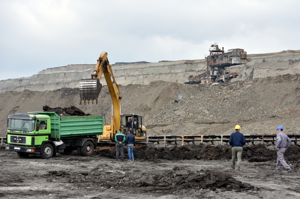 Workers are seen at a lignite mine, near the town of Obiliq, Kosovo, October 12, 2021. Reuters/Laura Hasani