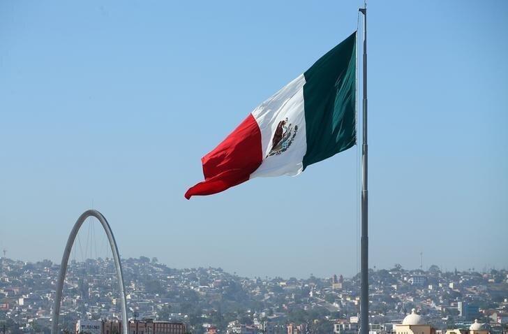 A Mexican flag is seen over the city of Tijuana, Mexico from San Ysidro, a district of San Diego, California, US, on April 21, 2017.  File Photo / Reuters

