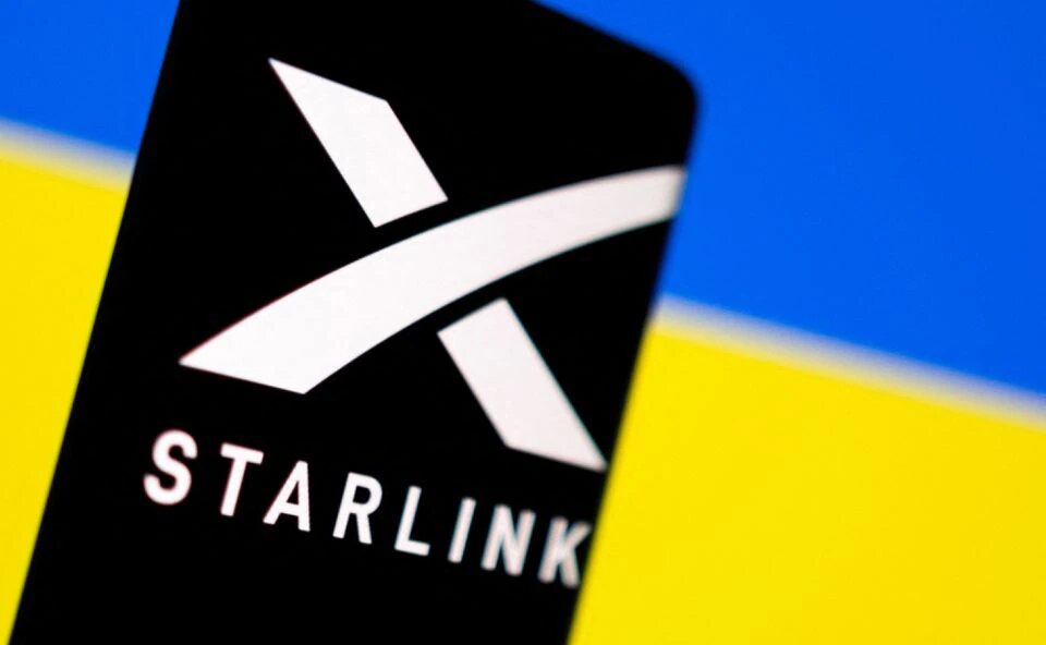 Starlink logo is seen on a smartphone in front of displayed Ukrainian flag in this illustration taken on February 27, 2022.   File Photo / Retuers

