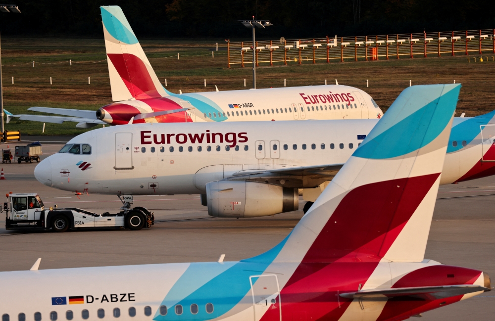 Aircrafts of Lufthansa's budget airline Eurowings stand on the tarmac of the Cologne-Bonn airport as Eurowings pilots go on a three-day strike, in Cologne, Germany, October, 17, 2022. REUTERS/Thilo Schmuelgen