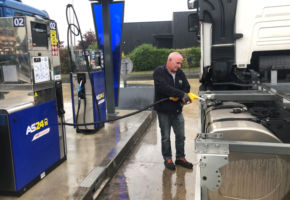 Truck driver Antonio Perreira, employee of FDE Transports, fills his fuel tank at a gas station dedicated to transport professionals in Mitry-Mory near Paris as refinery strikes in France continue to affect gas stations, France, on October 17, 2022. REUTERS/Caroline Pailliez