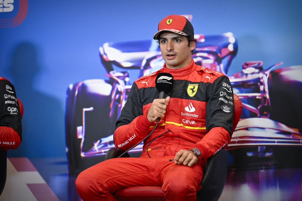 Scuderia Ferrari driver Carlos Sainz of Team Spain is interviewed after he takes the pole position during qualifying for the US Grand Prix at Circuit of the Americas in Austin, Texas, US, October 22, 2022. (Jerome Miron-USA TODAY Sports via Reuters)