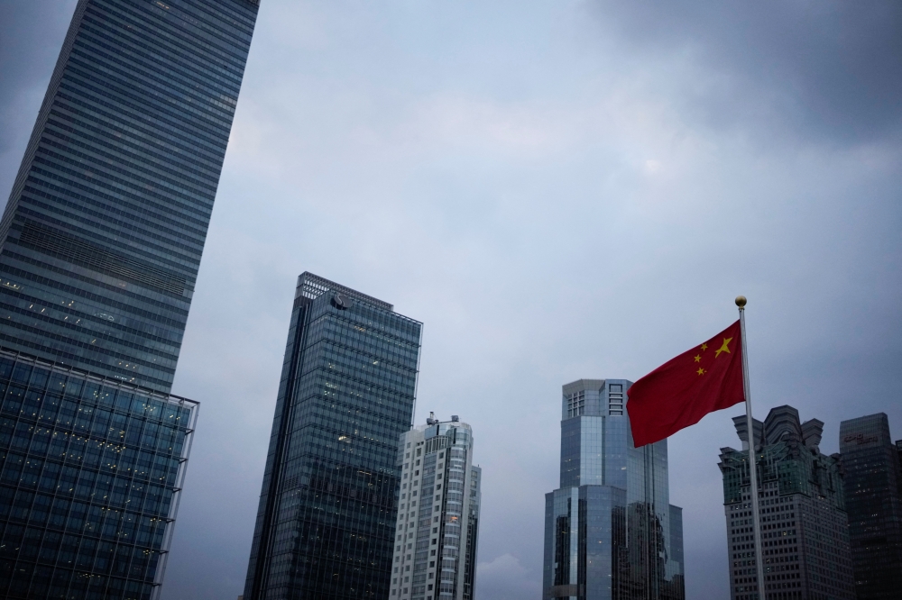 A Chinese national flag is pictured, following the coronavirus disease (COVID-19) outbreak, in Shanghai, China, October 14, 2022. Reuters/Aly Song