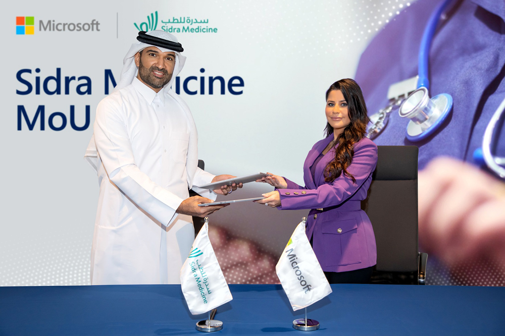 Chief Research Officer of Sidra Medicine Dr. Khalid Fakhro (left) and General Manager of Microsoft Qatar Lana Khalaf at the MoU signing event.
