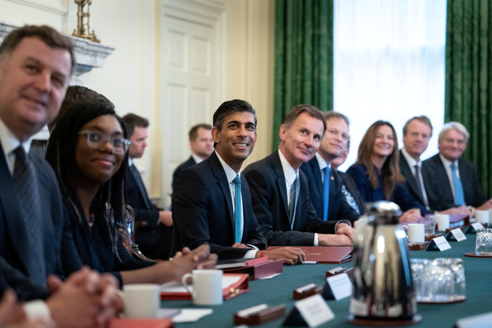 British Prime Minister Rishi Sunak, alongside Chancellor of the Exchequer Jeremy Hunt holds his first Cabinet meeting in Downing street, London, Britain, on October 26, 2022. Stefan Rousseau/Pool via REUTERS
 