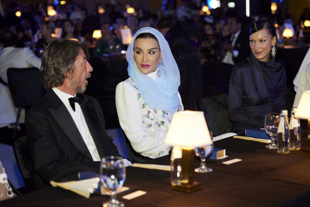 Honorary Chair of Fashion Trust Arabia HH Sheikha Moza bint Nasser, Italian fashion designer Pierpaolo Piccioli and Palestinian-American supermodel Bella Hadid at the Fashion Trust Arabia (FTA) Awards Ceremony held at the National Museum of Qatar on October 26, 2022.