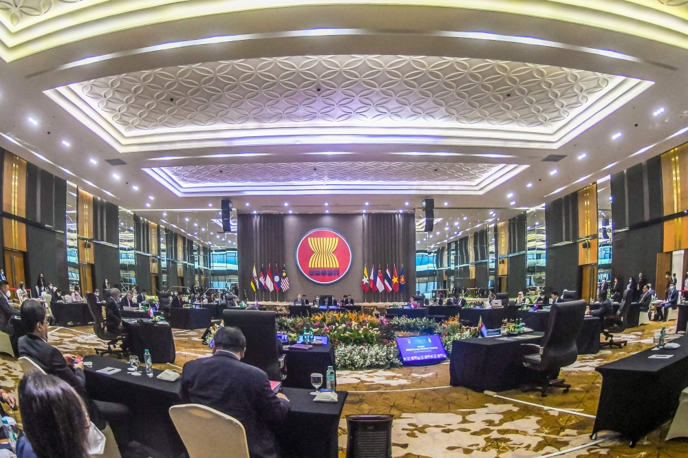This handout picture taken and released on October 27, 2022 by the Indonesian Ministry of Foreign Affairs shows the foreign ministers of the Association of Southeast Asia Nations (ASEAN) countries attending the Special ASEAN Foreign Ministers' Meeting (SAFMM) at ASEAN secretariat general building, in Jakarta.  Photo by Handout / INDONESIAN FOREIGN MINISTRY / AFP