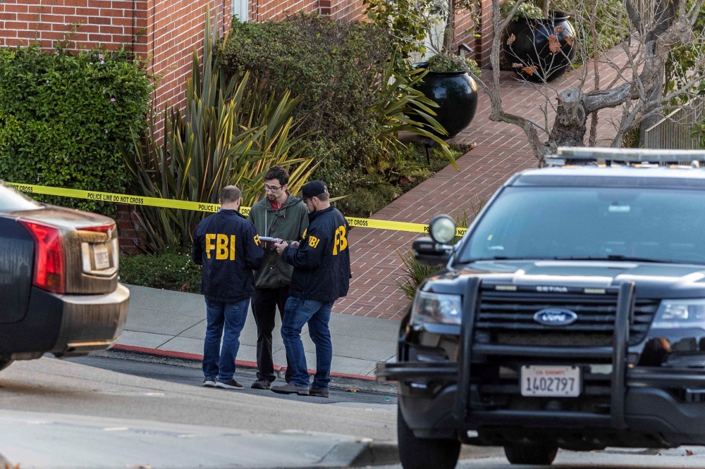 FBI agents work outside the home of US House Speaker Nancy Pelosi where her husband Paul Pelosi was violently assaulted after a break-in at their house, in San Francisco, California, US, October 28, 2022. (REUTERS/Carlos Barria)