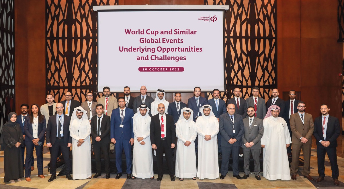 Officials and participants pose for a group photo.