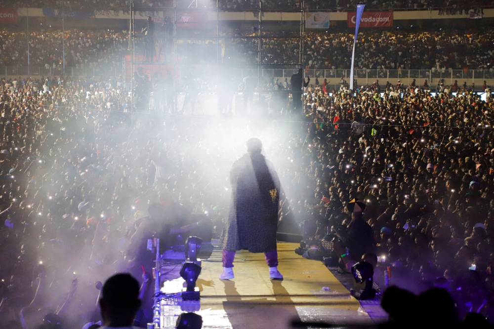 Congolese singer Fally Ipupa performs during his concert at the overcrowded Martyrs stadium in Kinshasa, Democratic Republic of Congo, October 29, 2022. (REUTERS/Paul Lorgerie)
