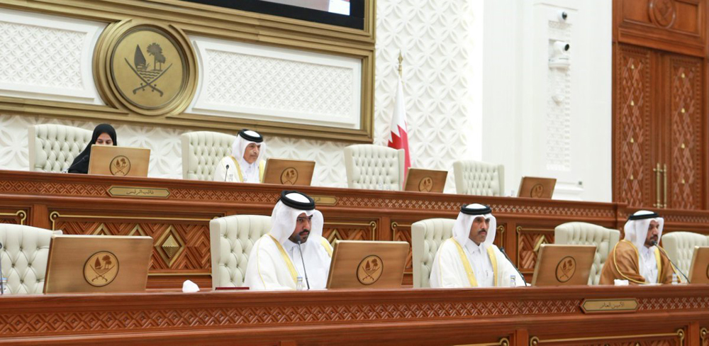 Speaker of the Shura Council H E Hassan bin Abdullah Al Ghanim (top right) chairing the Shura Council meeting in Tamim bin Hamad Hall at the council’s headquarters.