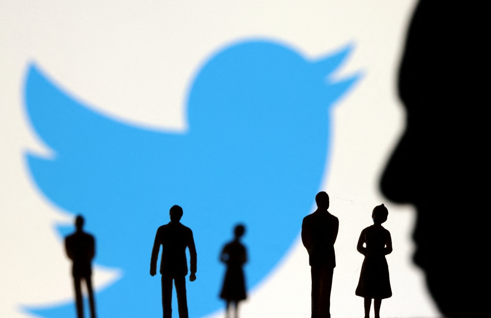 Elon Musk photo, small figurines and Twitter logo are seen in this illustration taken November 4, 2022. (REUTERS/Dado Ruvic)