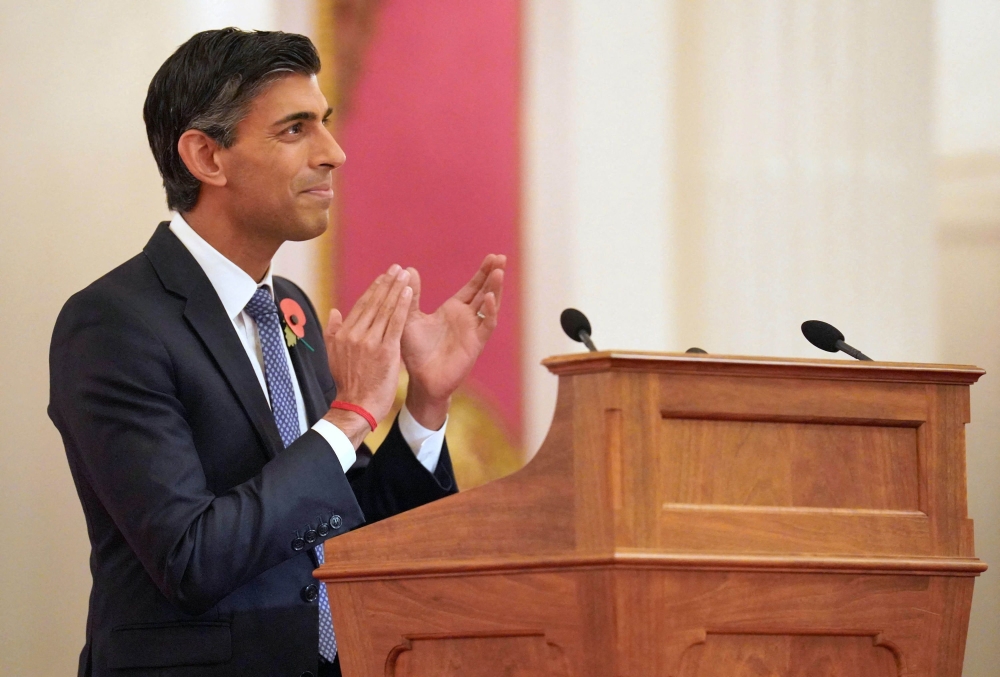 Britain's Prime Minister Rishi Sunak delivers a speech at a reception for world leaders, business figures, environmentalists and NGOs at Buckingham Palace in London, on November 4, 2022, ahead of the COP27 Summit, being held in Sharm El-Sheikh, Egypt from November 6-18, 2022. (Photo by Jonathan Brady / POOL / AFP)