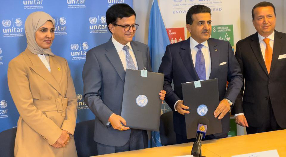 GOPAC President H E Dr. Ali bin Fetais Al Marri (second right); UN Assistant Secretary-General and Executive Director of UNITAR H E Nikhil Seth (second left); and Permanent Representative of Qatar to the United Nations in Geneva H E Dr. Hind bint Abdulrahman Al Muftah (first left) at the agreement signing. 