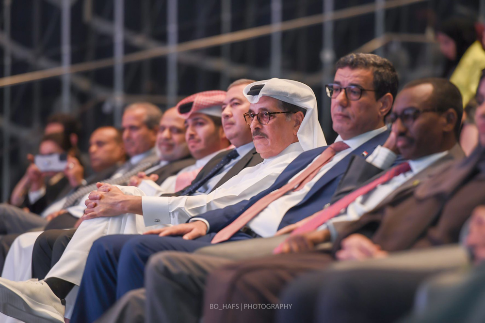 H E Dr. Hamad bin Abdulaziz Al Kawari, Minister of State and President of Qatar National Library, with H E Rajeh Hussein Badi, Ambassador of Yemen to Qatar, and other guests at the event. 