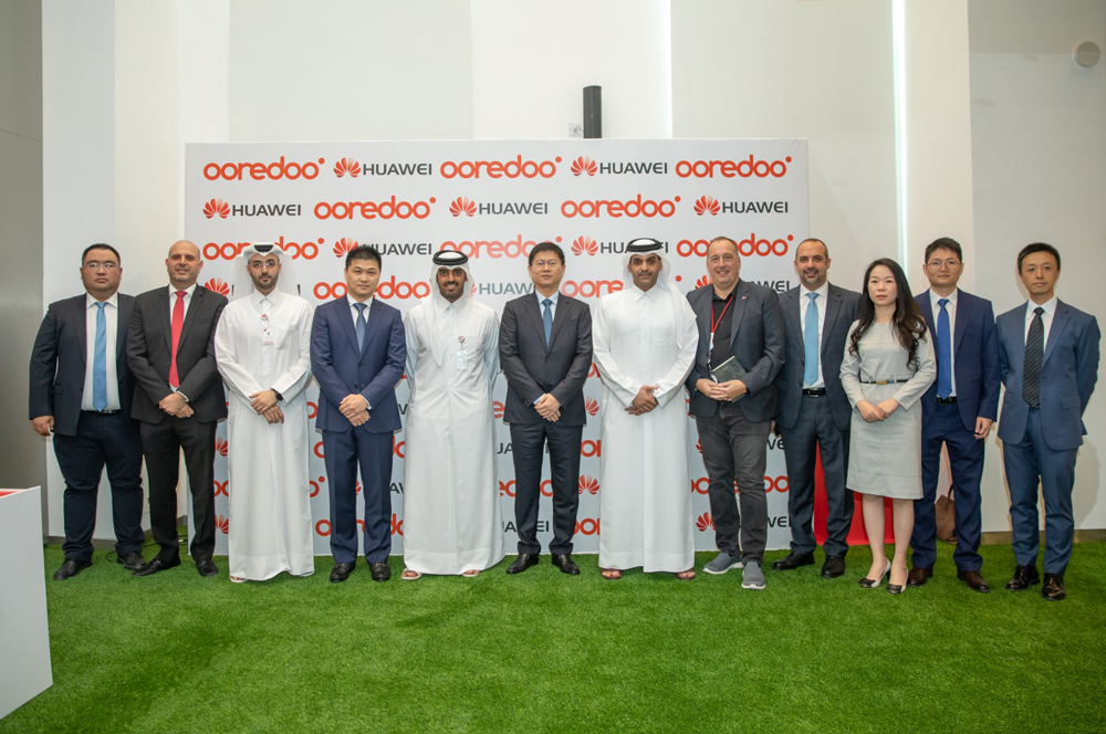 Ooredoo and Huawei officials during the ceremony.