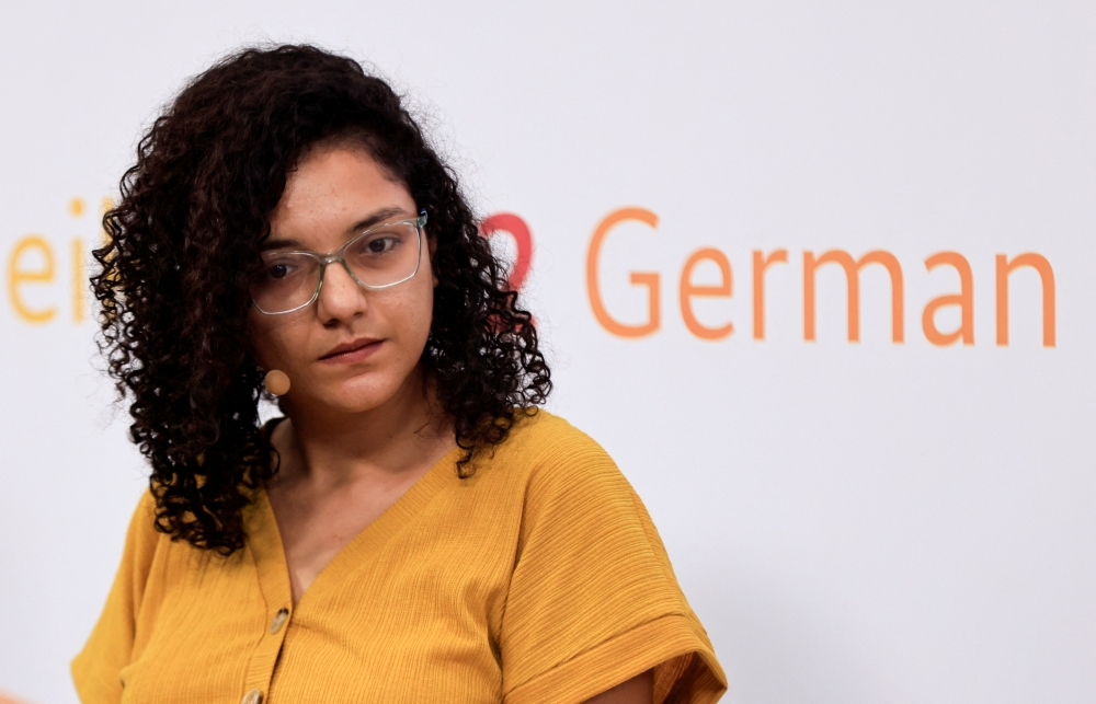 Sanaa Seif, sister of Egyptian-British hunger striker Alaa Abd el-Fattah, attends a talk at the COP27 climate summit in the Red Sea resort of Sharm el-Sheikh, Egypt, on November 8, 2022. REUTERS/Emilie Madi