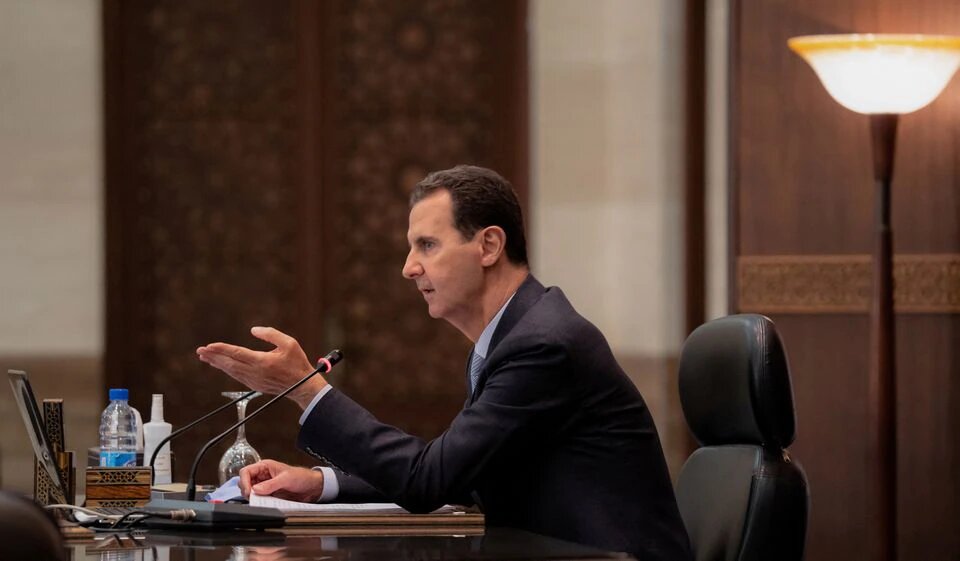 Syria's President Bashar al-Assad speaks as he meets with the Syrian cabinet in Damascus, Syria in this handout picture released by Sana on March 30, 2021. File Photo / Reuters