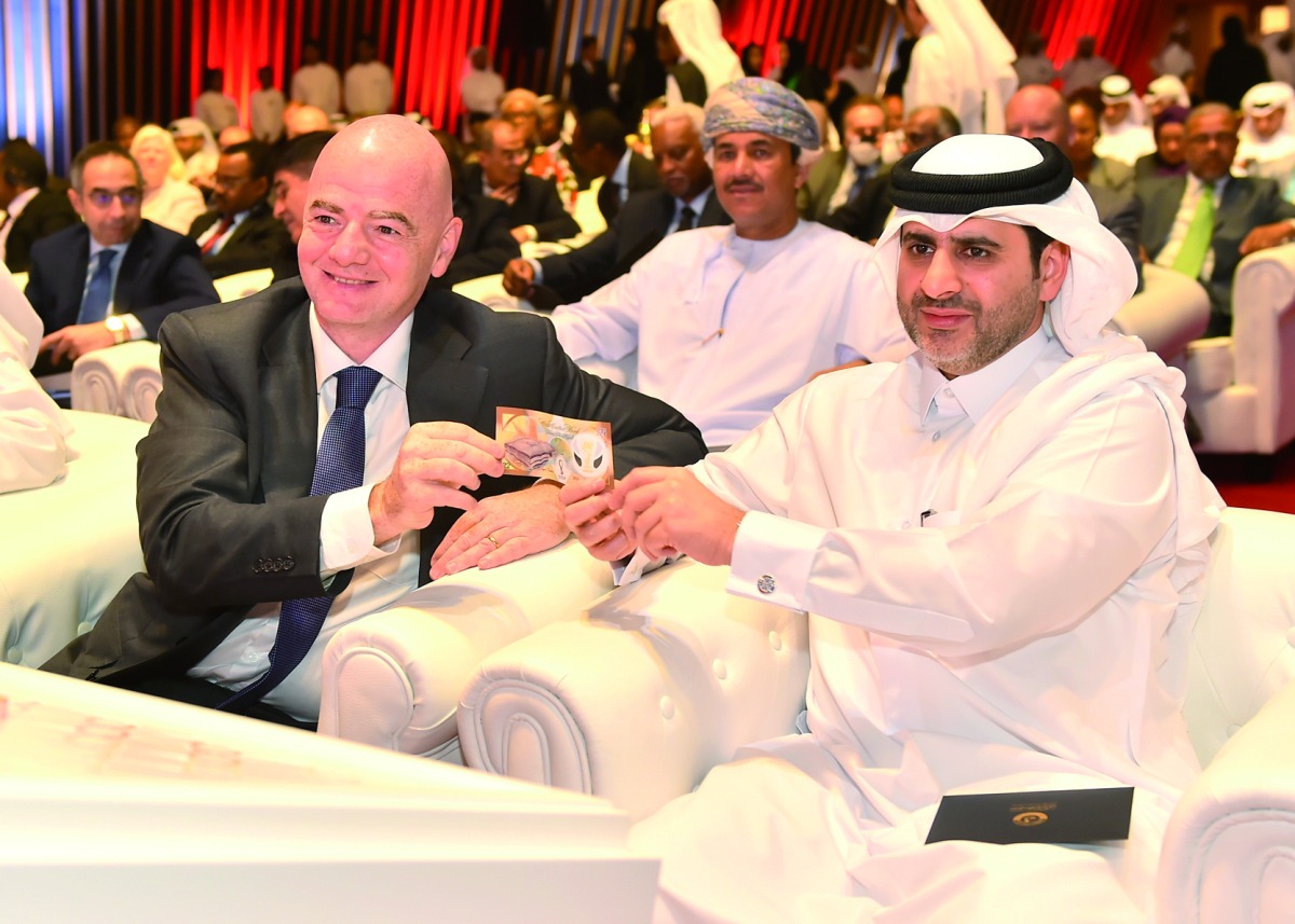 QCB Governor H E Sheikh Bandar bin Mohammed bin Saoud Al Thani with FIFA President Gianni Infantino during the unveiling ceremony of FIFA World Cup Qatar 2022 commemorative banknotes at Sheraton Hotel, yesterday. PIC: ABDUL BASIT
