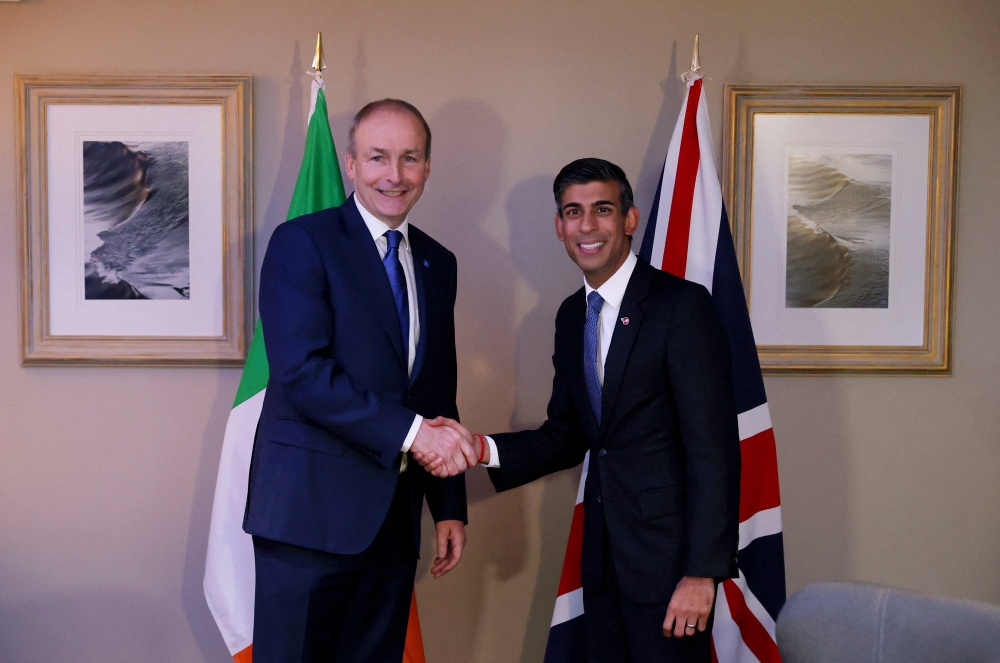 British Prime Minister Rishi Sunak shakes hands with Ireland's Taoiseach Micheal Martin, during the British-Irish Council Summit, in Blackpool, Britain, on November 10, 2022. Cameron Smith/Pool via REUTERS