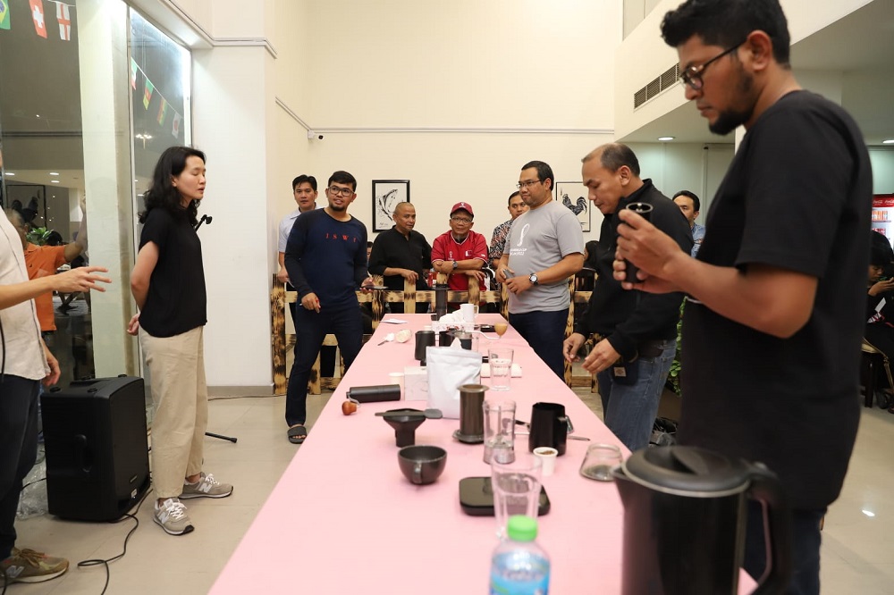 Participants during the manual coffee brew competition.