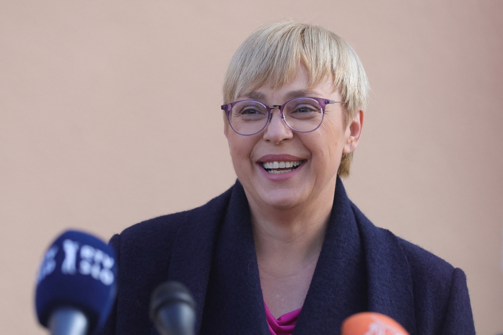 Slovenian presidential candidate Natasa Pirc Musar speaks to the media during the second round of presidential elections in Radomlje, Slovenia, November 13, 2022. (REUTERS/Borut Zivulovic)