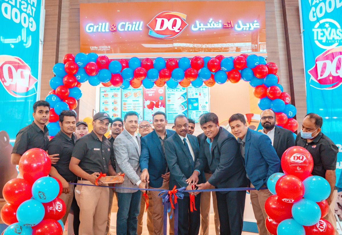 Dairy Queen officials inaugurate the opening of the outlet.     