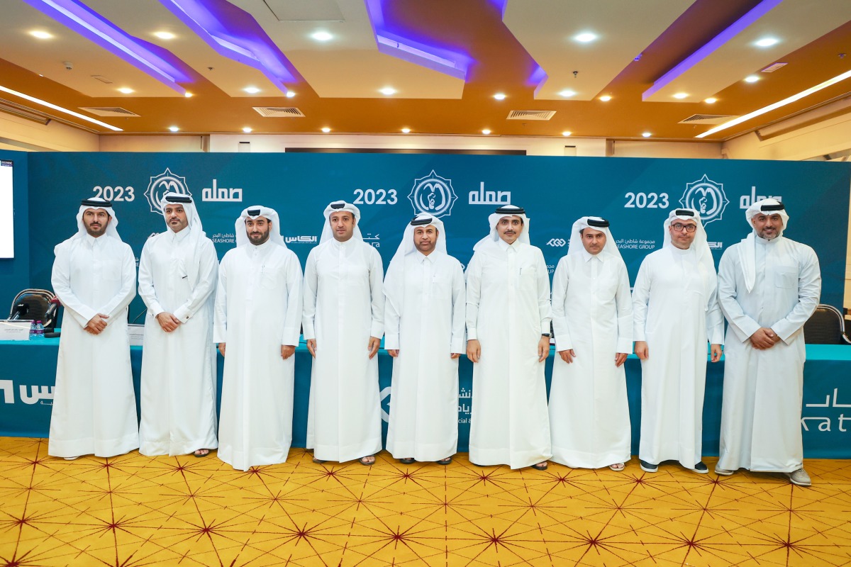 Sheikh Saud bin Khalid bin Hamad Al Thani, Board Member of Qatar Insurance Group; Prof. Dr. Khalid bin Ibrahim Al Sulaiti, Katara Cultural Village Foundation General Manager with other officials pose for a group photo.