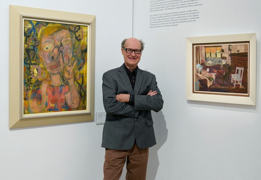 James Warhola, US artist and illustrator, stands next to his uncle Andy Warhol痴 