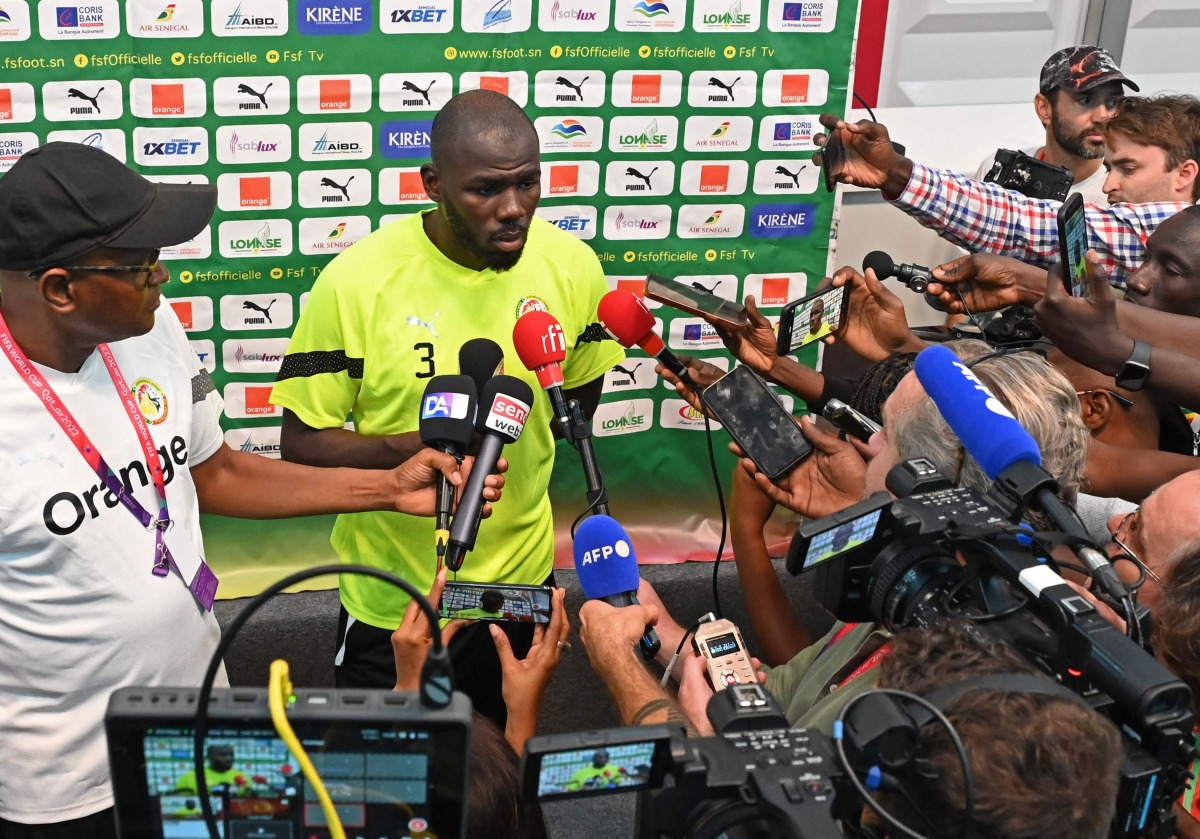 Senegal’s defender Kalidou Koulibaly speaks to journalists following a training session in Doha. AFP