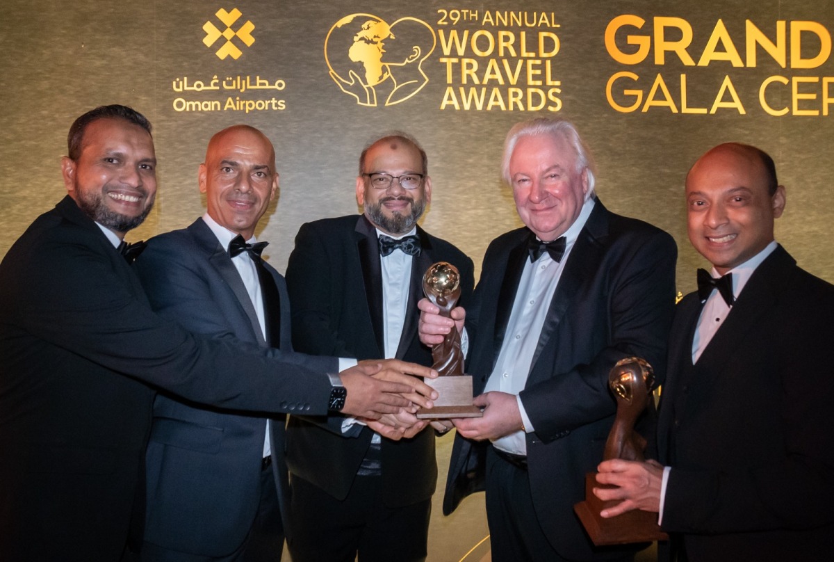 Tawfeeq Holidays officials with the award.