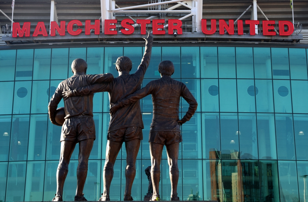 General view of the United Trinity statue outside Old Trafford.  REUTERS/Phil Noble