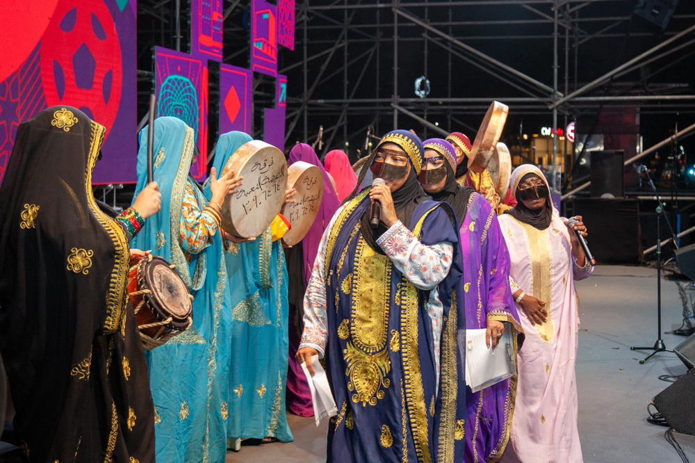 Members of Al Nahda Qatari Ladies Group during a performance.