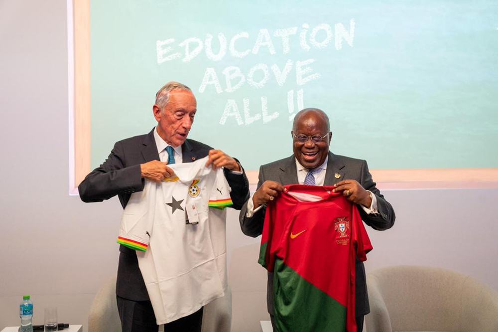 Portuguese  President Marcelo Rebelo de Sousa and Ghanaian  President Nana Akufo-Addo exchange jerseys before a football match between two countries during an event hosted by Education Above All  inside the FIFA Fan Festival. 