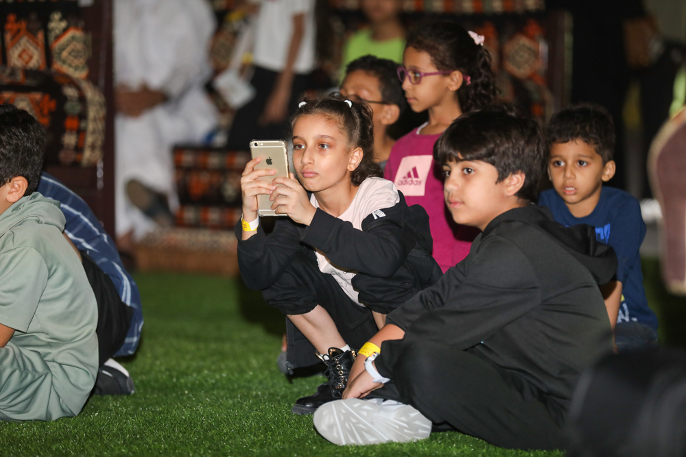 Children attend an event at Darb Al Saai.