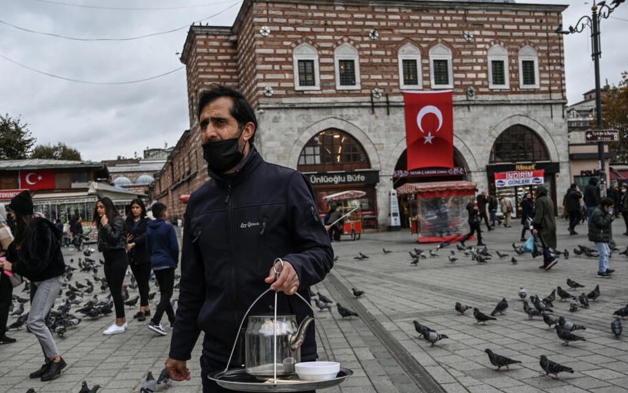 File photo: Tea is taken in bazaars across the country, where tea-sellers still walk the streets of the city serving the drink to traders and their customers, in Istanbul, Turkey. (AFP/Ozan Kose)