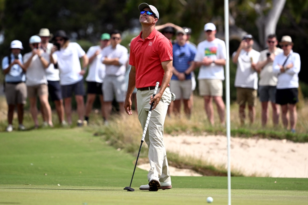 Australia's Adam Scott reacts during the final round of the Men's Australian Open golf tournament at the Victoria course in Melbourne on December 4, 2022. (Photo by William WEST / AFP) 