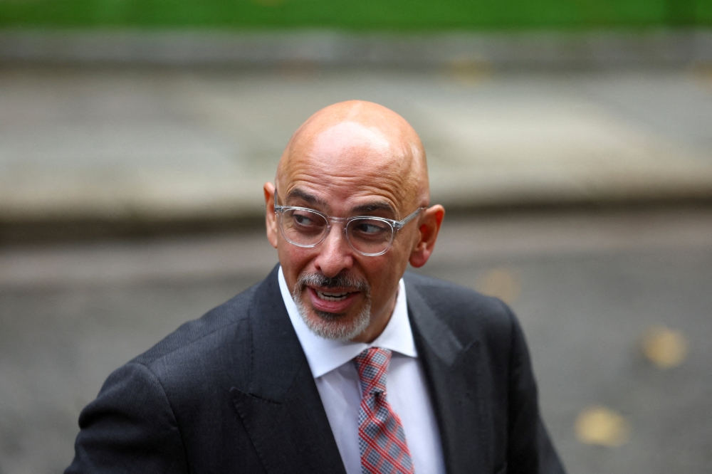 The chairman of Britain's Conservative party, Nadhim Zahawi, walks outside Number 10 Downing Street, on the day of a cabinet meeting, in London, Britain, October 26, 2022. REUTERS/Hannah Mckay/File Photo