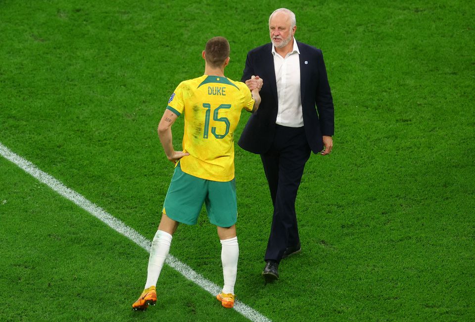 December 4, 2022 Australia's Mitchell Duke shakes hands with coach Graham Arnold after being eliminated from the World Cup REUTERS/Paul Childs/File Photo