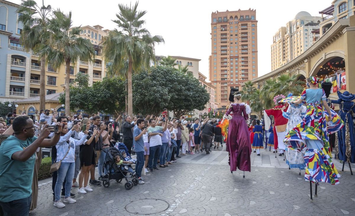 Visitors enjoying the festivities at The Pearl during FIFA World Cup  