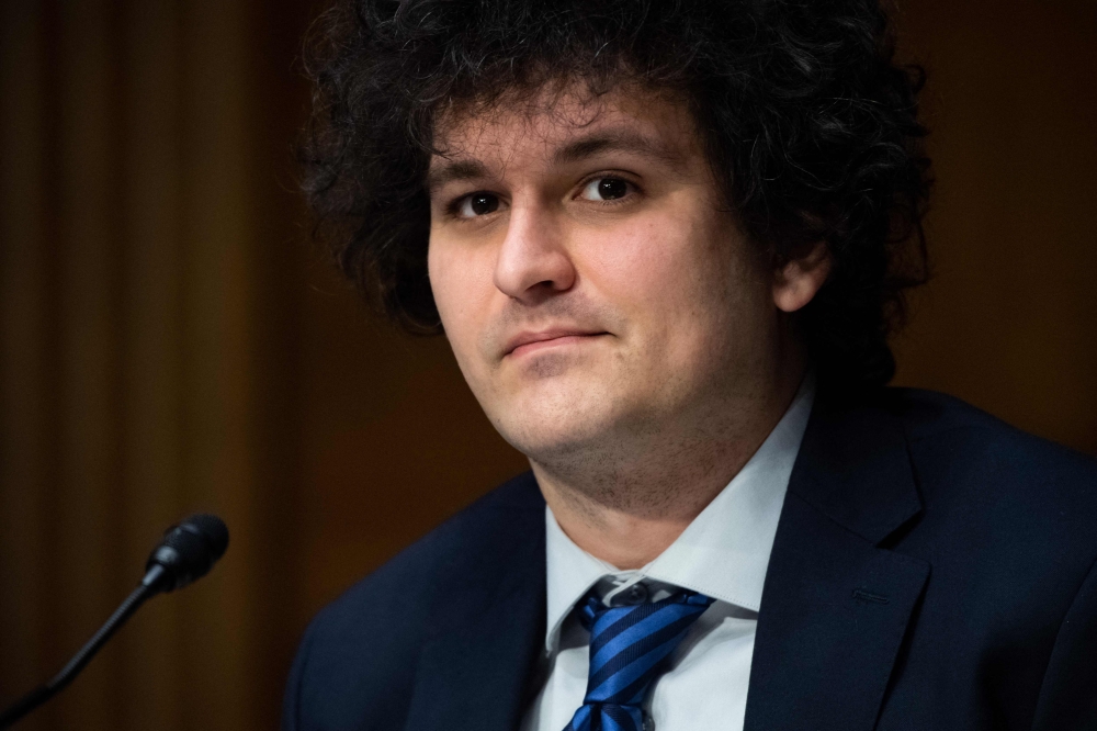 (FILES) In this file photo taken on February 09, 2022, Samuel Bankman-Fried, founder and CEO of FTX, testifies during a Senate Committee on Agriculture, Nutrition and Forestry hearing about 