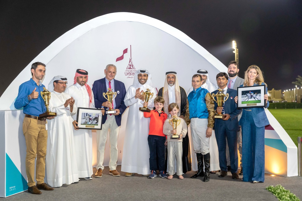H E Salah bin Ghanem Al Ali, Minister of Sports and Youth, with the connection of Sealine after Wathnan Racing's eight-year-old horse won the Late Sheikh Jassim Bin Mohammed Al Thani Trophy at Al Uqda Racecourse yesterday.
