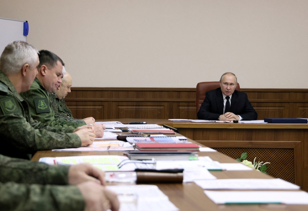 Russian President Vladimir Putin visits the Joint Headquarters of the Russian armed forces involved in military operations in Ukraine, in an unknown location in Russia, in this picture released December 17, 2022. Sputnik/Gavriil Grigorov/Kremlin via Reuters
