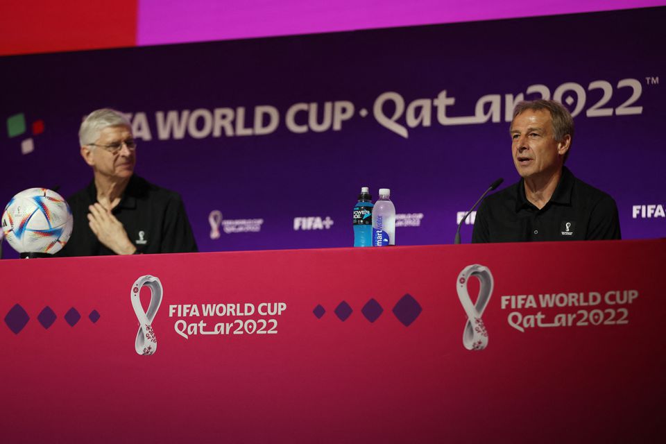 FIFA Chief of Global Football Development Arsene Wenger and Technical Study Group member Jurgen Klinsmann during a FIFA World Cup Qatar 2022  press conference at the Main Media Center, Doha, Qatar, on November 19, 2022.  File Photo / Reuters