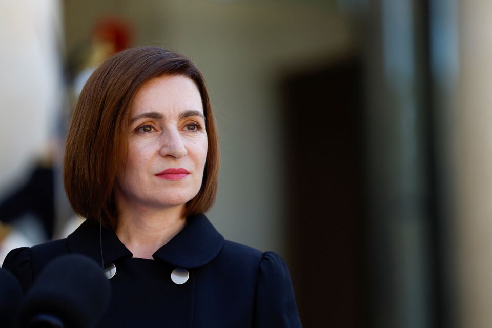 Moldovan President Maia Sandu delivers a joint statement with French President Emmanuel Macron before a meeting at the Elysee Palace in Paris, France May 19, 2022. REUTERS/Gonzalo Fuentes

