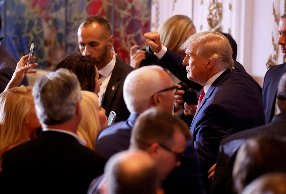 Former US President Donald Trump thrusts his fist as he greets the crowd after announcing that he will once again run for US president in the 2024 US presidential election, during an event at his Mar-a-Lago estate in Palm Beach, Florida, US on November 15, 2022. File Photo / Reuters