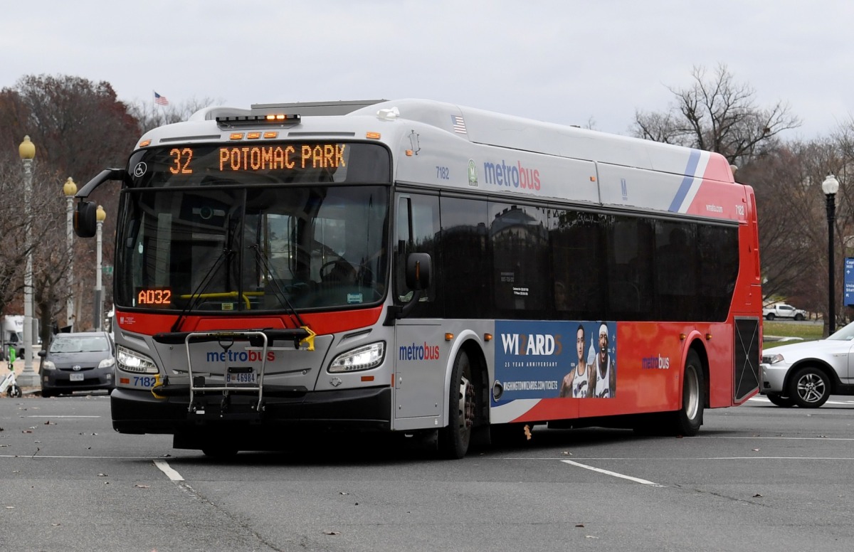 A bus is seen in Washington, DC, on December 12, 2022. The Washington government voted to institute free bus rides for all starting in the summer of 2023. (Photo by OLIVIER DOULIERY / AFP)